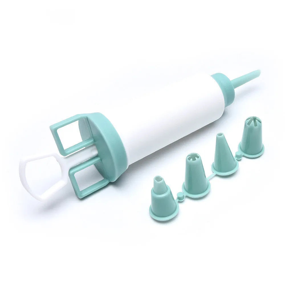 Five-piece cream mounted nozzle set with PP mounting gun and four nozzles in green