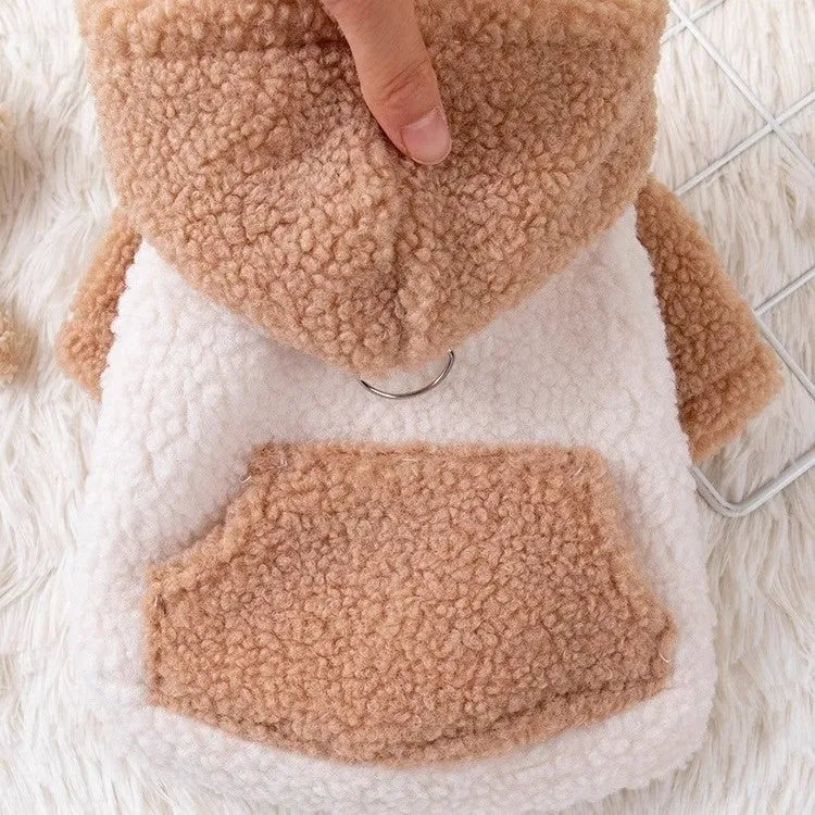 A brown hooded cotton-padded coat for a dog, shown from the side.