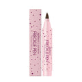 Close-up of a freckle pen applicator with cap, showing dark brown ink tip for precise dot application on skin.