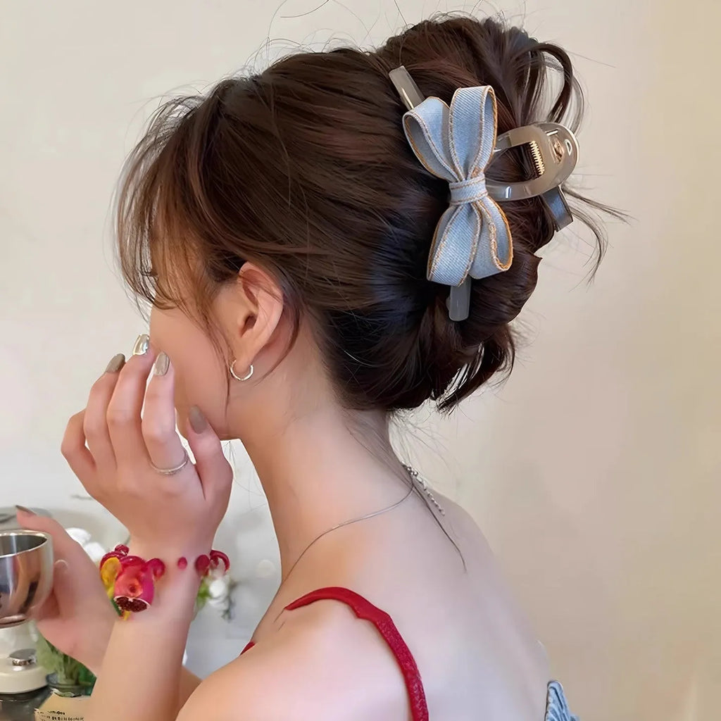 Blue denim bow barrette with cloth bow and metal clip on women back head hair
