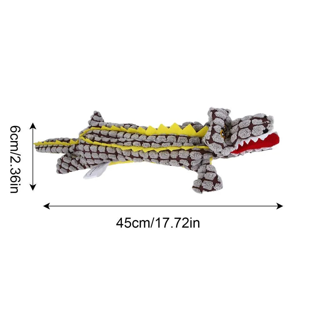 Blue corduroy crocodile-shaped squeaky dog toy shown next to size measurement