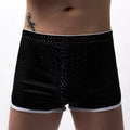 Men's grey three-point boxer shorts with a mid-waistband on a plain background.