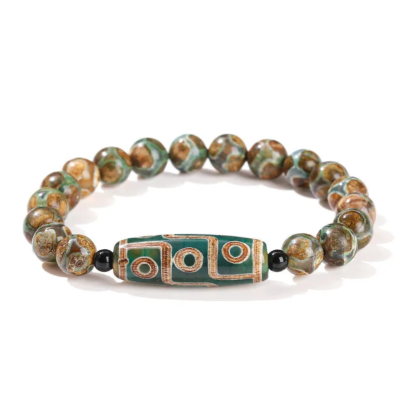 Handmade barrel shaped Dzi bead bracelet in green with geometry design