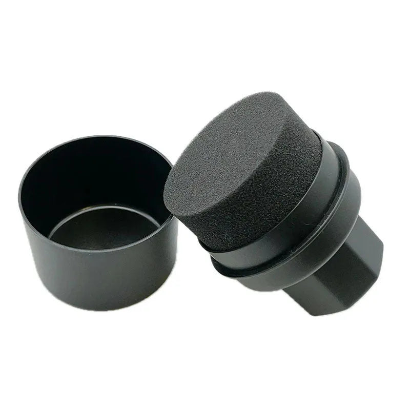 Black car tyre polishing sponge brush with high-density foam head and a white protective lid on a tyre.