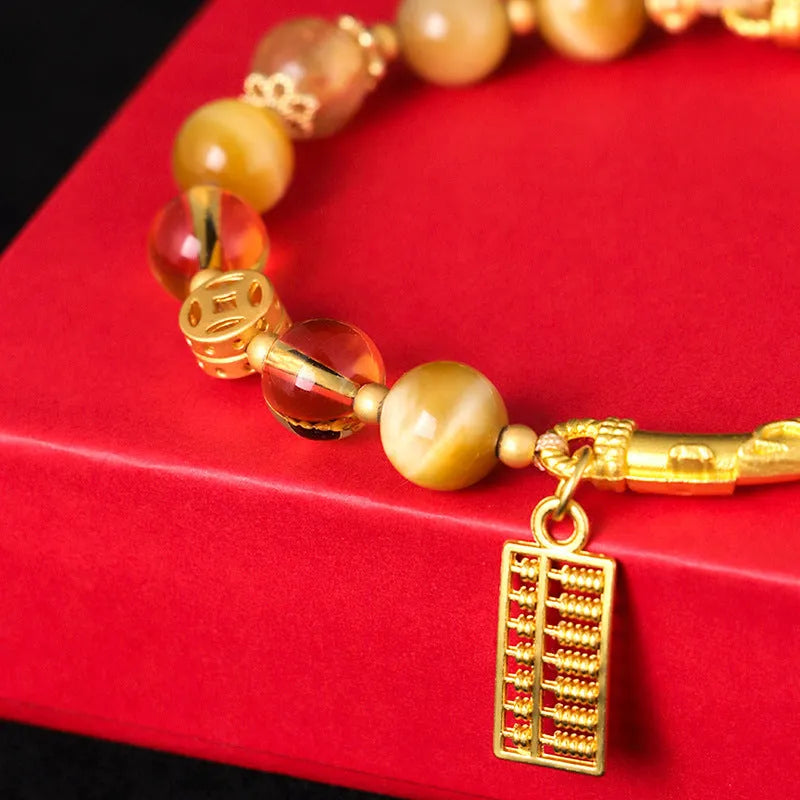 Tiger eye and citrine beaded bracelet with yellow crystal and diamond-shaped copper parts for women