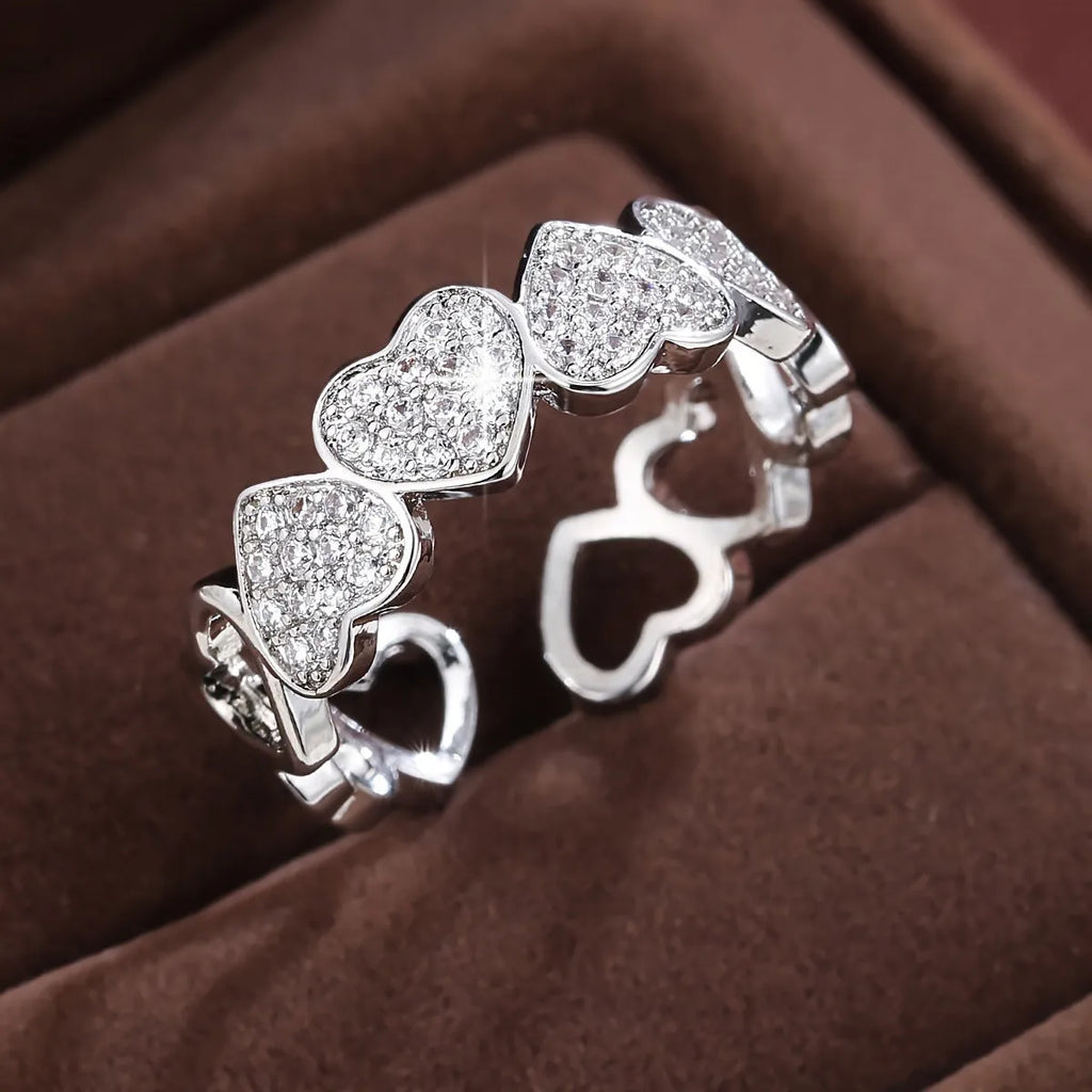 Adjustable couples ring in gold or silver with geometric love heart design