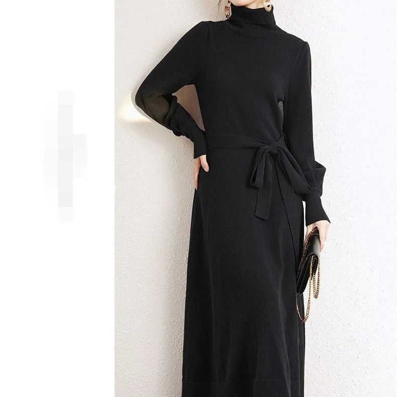 Rose red turtleneck knit dress with long sleeves, elastic waist, and a loose, flowing mid-length skirt.