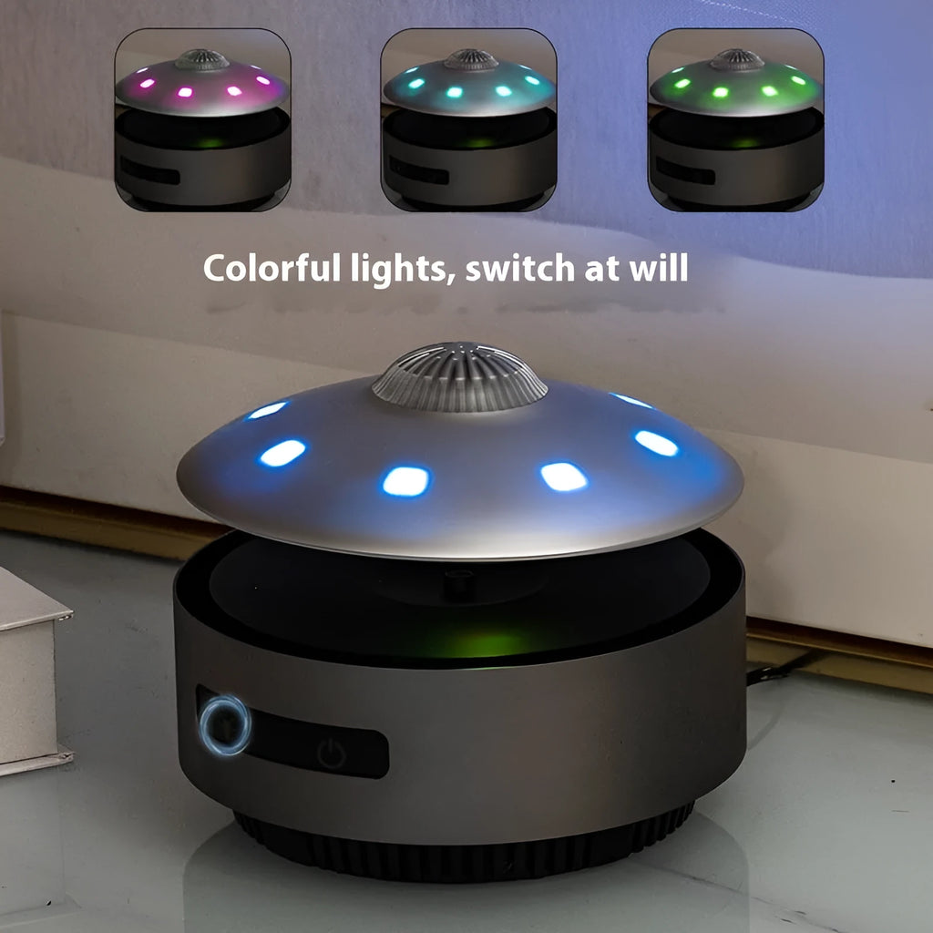 Black automatic lifting magnetic levitation Bluetooth speaker floating above its base.