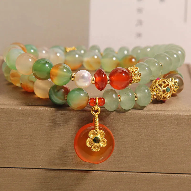Women's peacock green agate double ring bracelet with safety buckle closure and rhinestone accents
