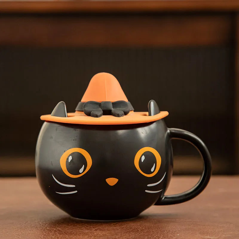 Black ceramic cat-shaped mug with pumpkin decoration and optional spoon lid, 355ml capacity.