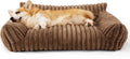 Beige corduroy cat couch with high backrest for pet support on a wooden floor.