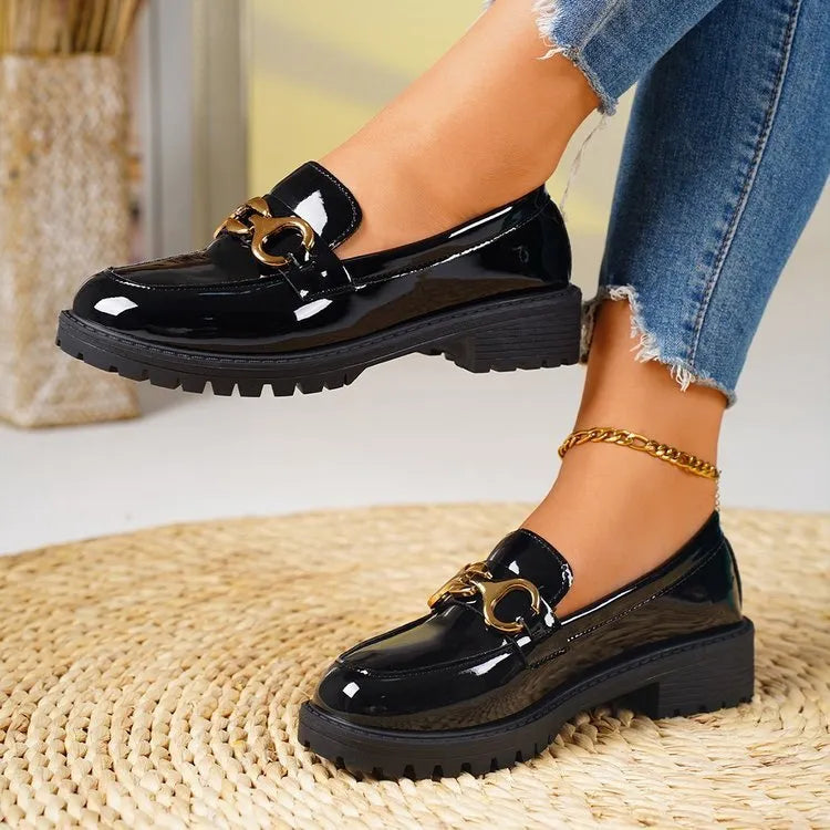 Chunky heel round toe pumps in black with metal accent, thick sole, PU upper and rubber sole