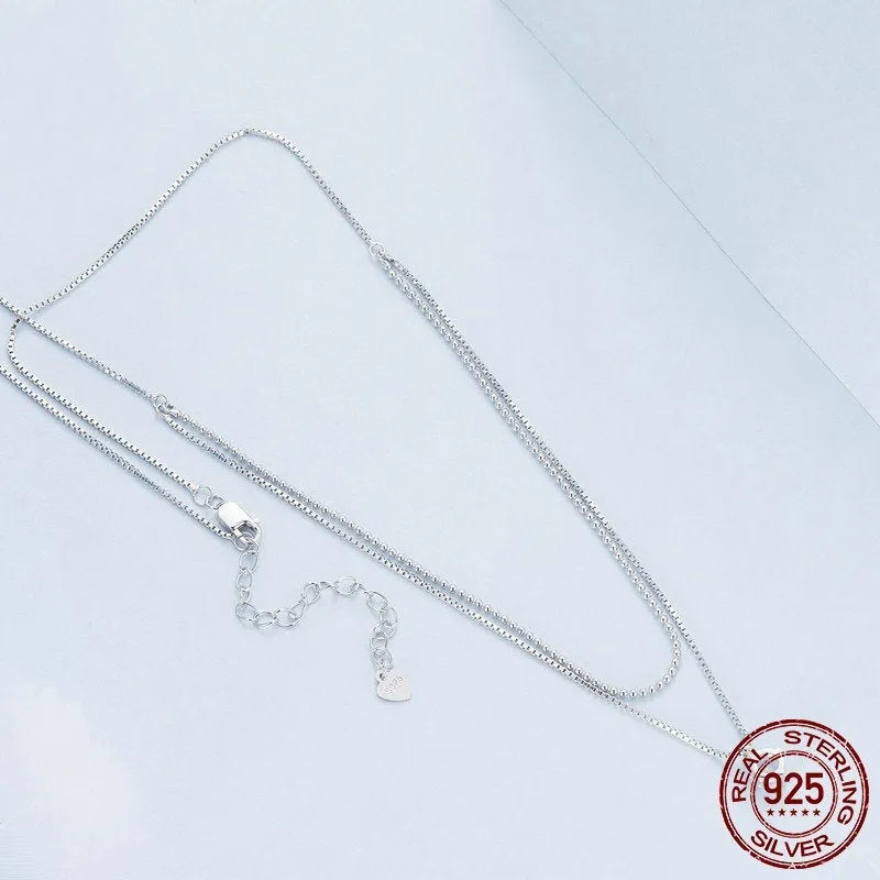 Sterling silver double-layer necklace with pearl chain design and pendant