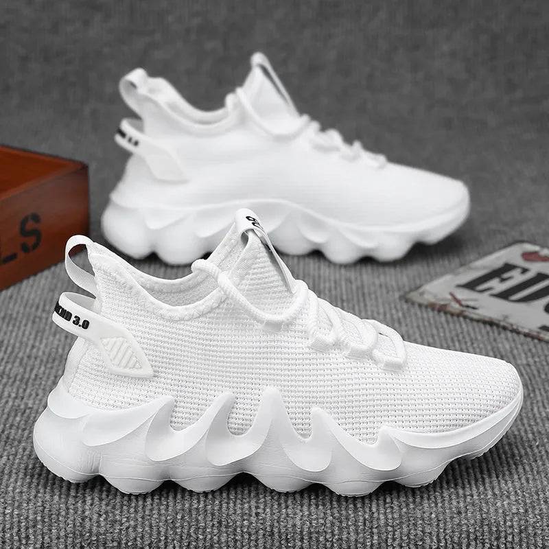 Men's black low-top sock-like sports shoes with a lace-up front and wear-resistant sole on a white background.
