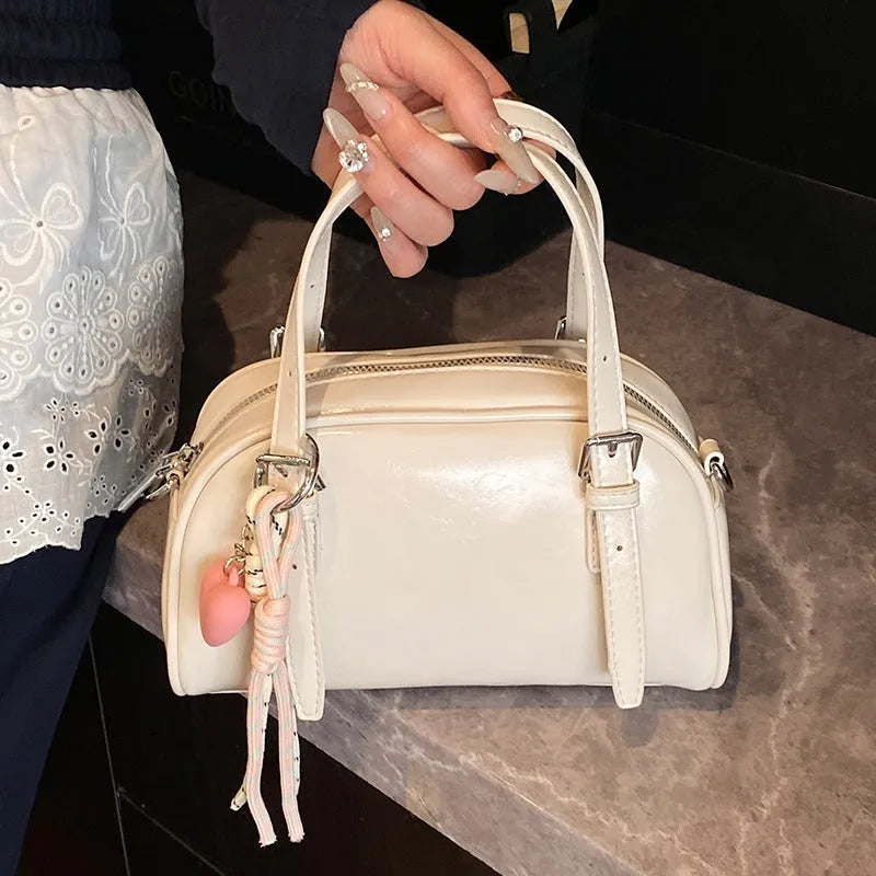 Korean style square shell shoulder bag for women in PU leather with colour and strap options