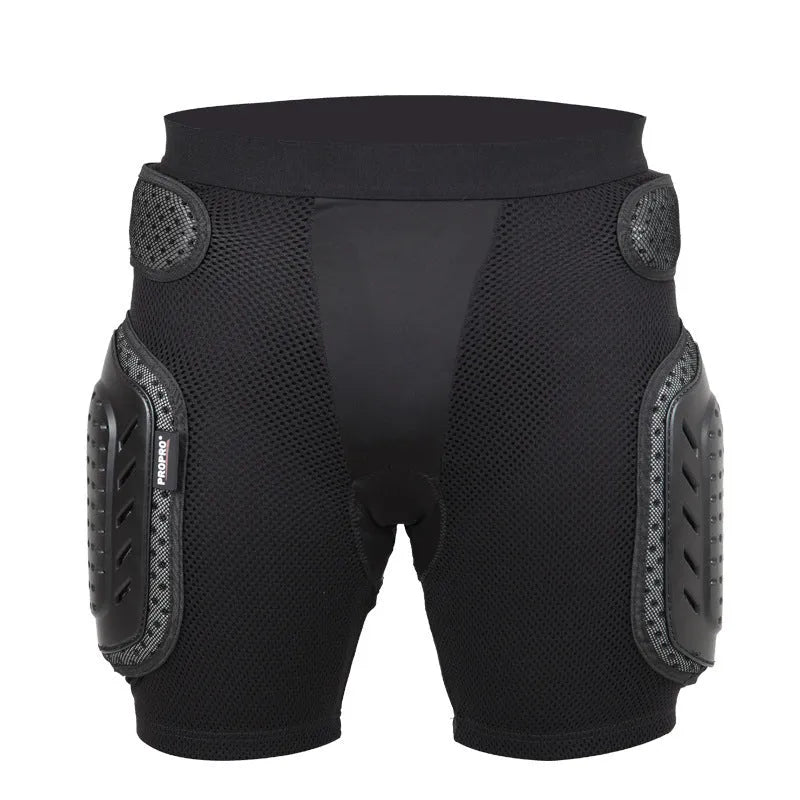 Black cycling hip protection pants with integrated pads, showing hook and loop fastener closures.