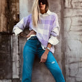 Lilac plaid print loose sweater with ribbed trim on the cuffs and a relaxed fit.