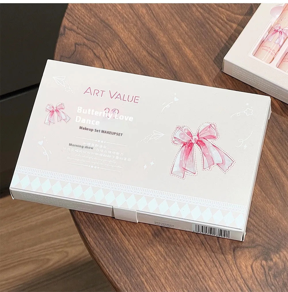 Butterfly Box makeup set showing pink lip mud, powder blusher, and necklace