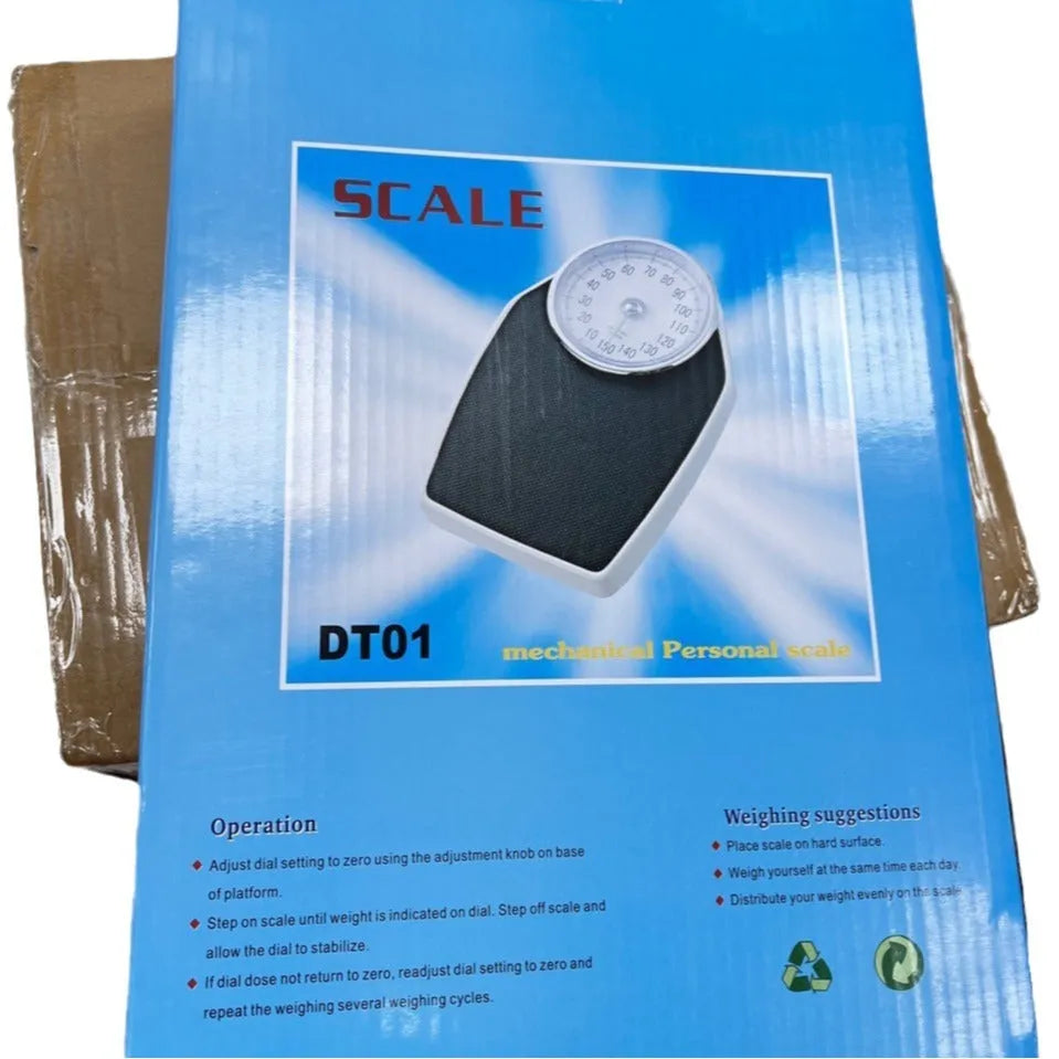 Black mechanical body weight scale with large dial and pointer on a simple platform