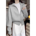 Hong Kong style grey double zipper knitted cardigan jacket with a floral pattern, shown on a model.