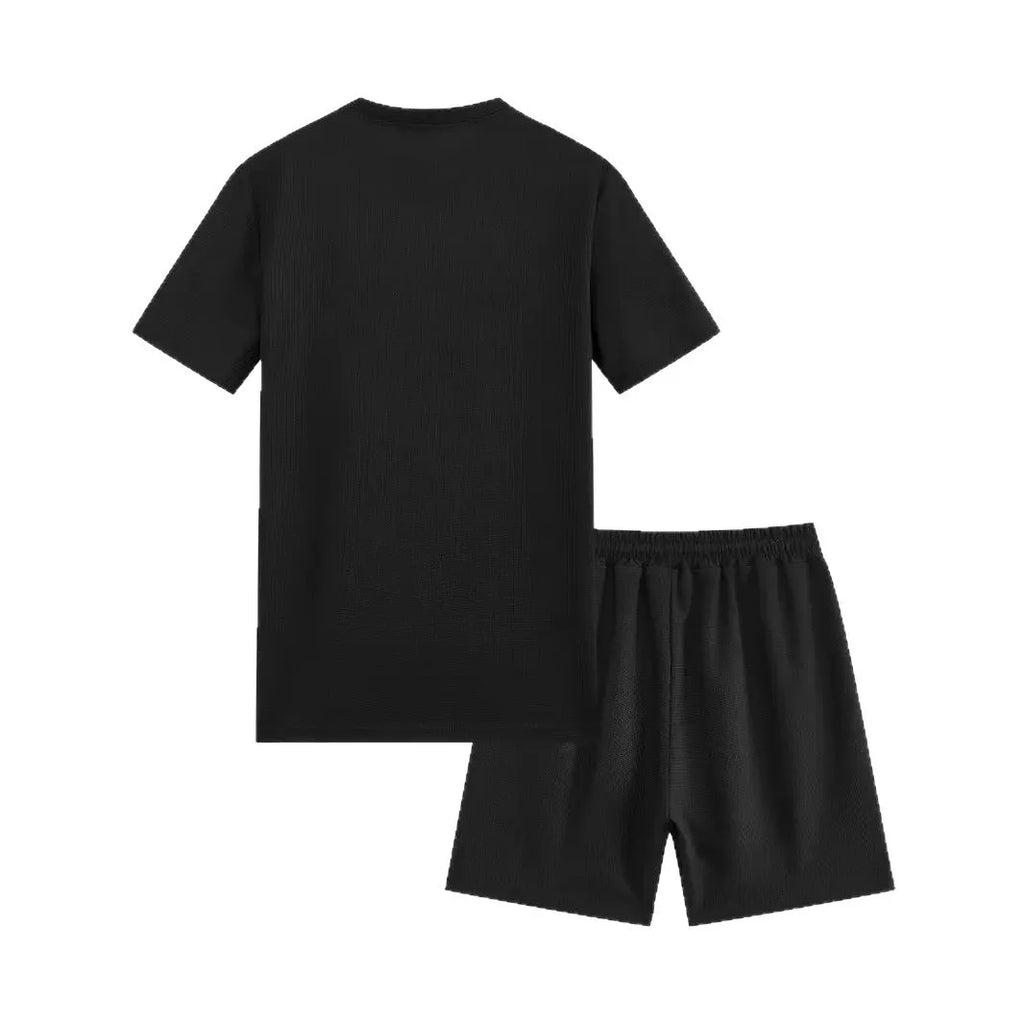 Men's apricot waffle texture short sleeve blouse and matching shorts laid flat.