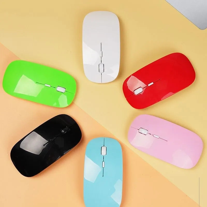 Bluetooth dual-mode wireless mouse in grey with mute buttons and 15cm USB charging cable