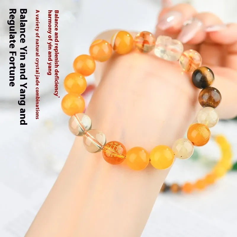 Handmade five elements natural crystal bracelet showing geometric beads in an elemental colour.