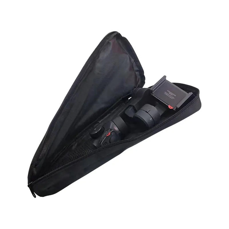 Black drawstring storage bag for mobile phone gimbal accessories on a table.