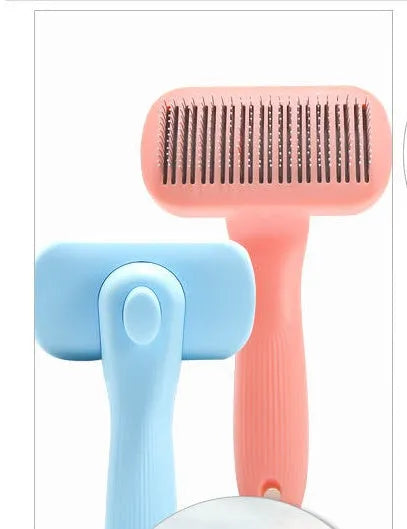 New Pet Needle Comb for dogs and cats, plastic construction, available in pink and blue, lightweight grooming brush