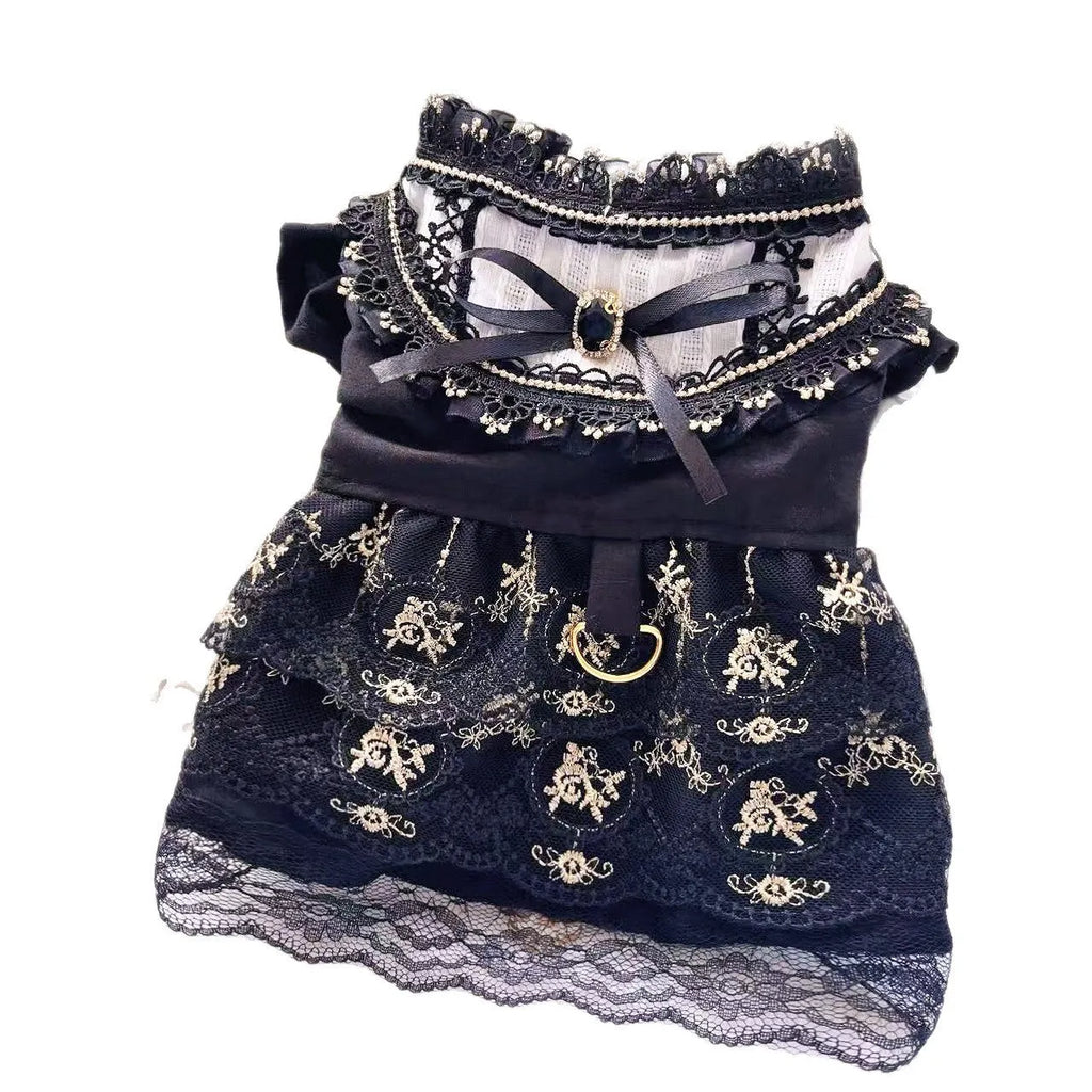 Golden layered gothic-style skirt for a small dog or cat on a mannequin, showing princess cut.