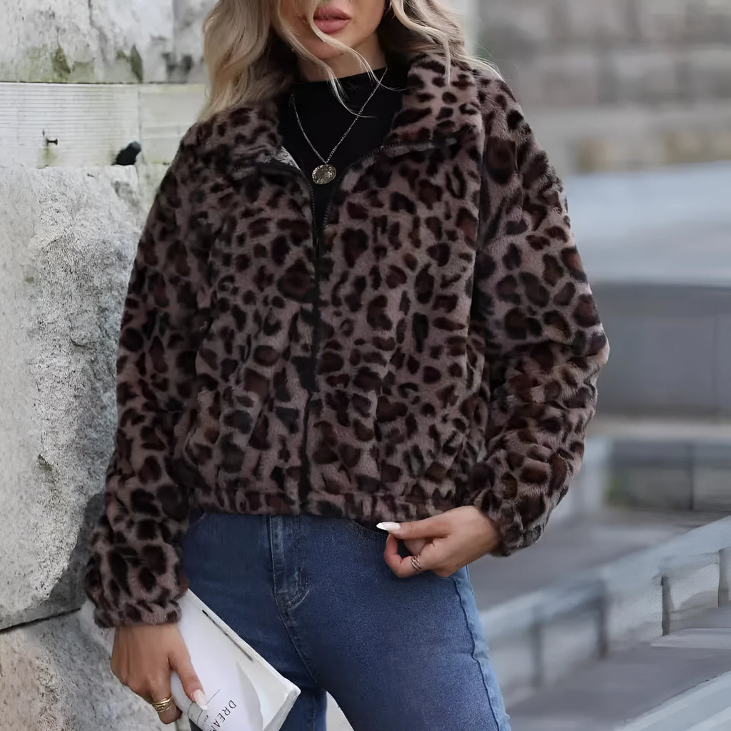 Women's loose long-sleeve leopard print coat with a zip front and raglan sleeves.