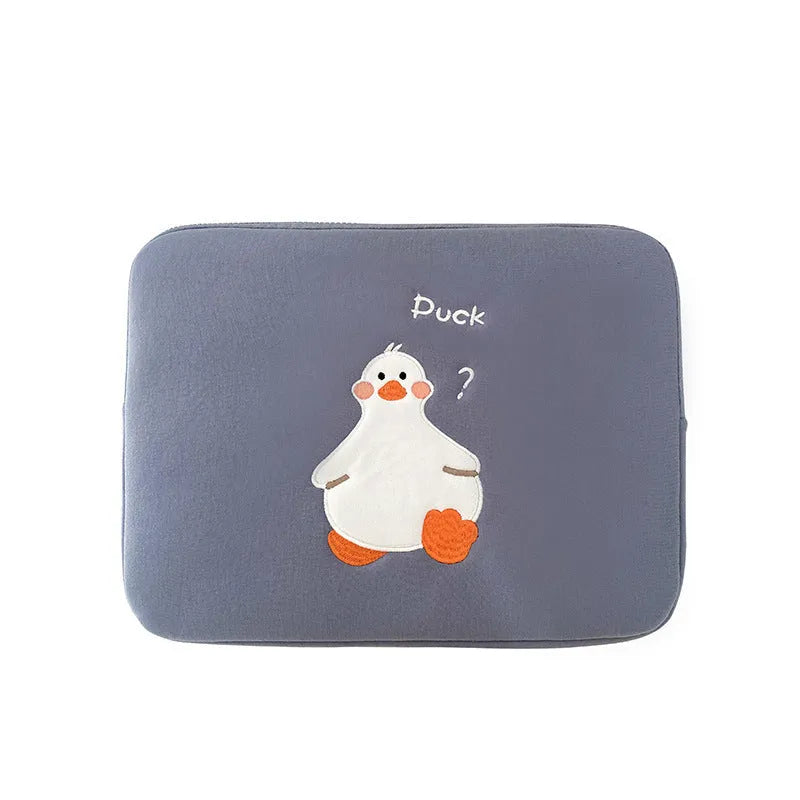 Blue cotton tablet case with embroidered cartoon duck design and a silver zipper.