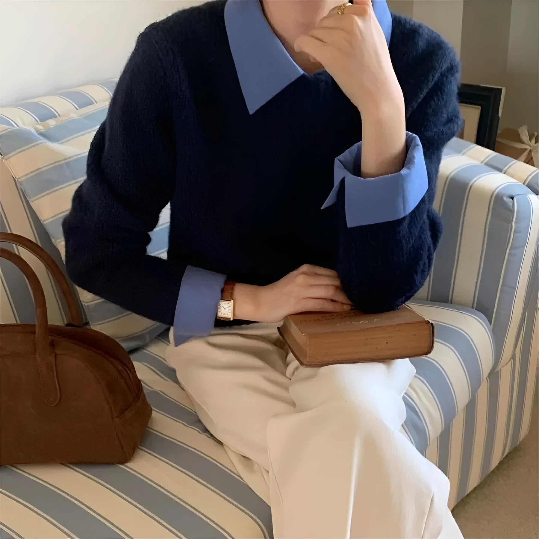 Women's loose knitwear top with contrast colour lapels in a choice of seven colours.