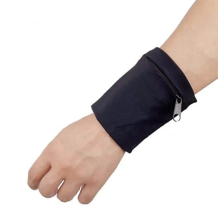 Adjustable strap wrist pouch for mobile phone, shown in packaging, dimensions 10cm by 10.5cm.