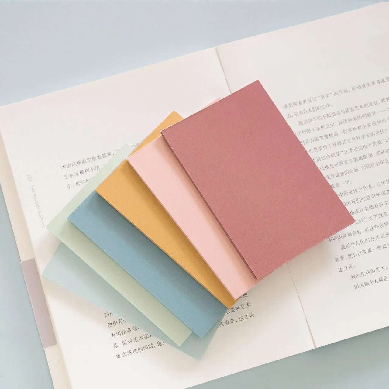 Pack of large 12cm x 8cm Post-it sticky notes in six different colours.