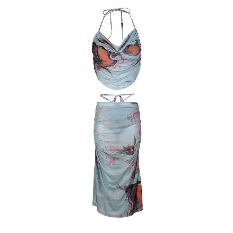 Blue women's bikini set with a diamond chain design on the briefs, shown as a three-piece swimsuit.