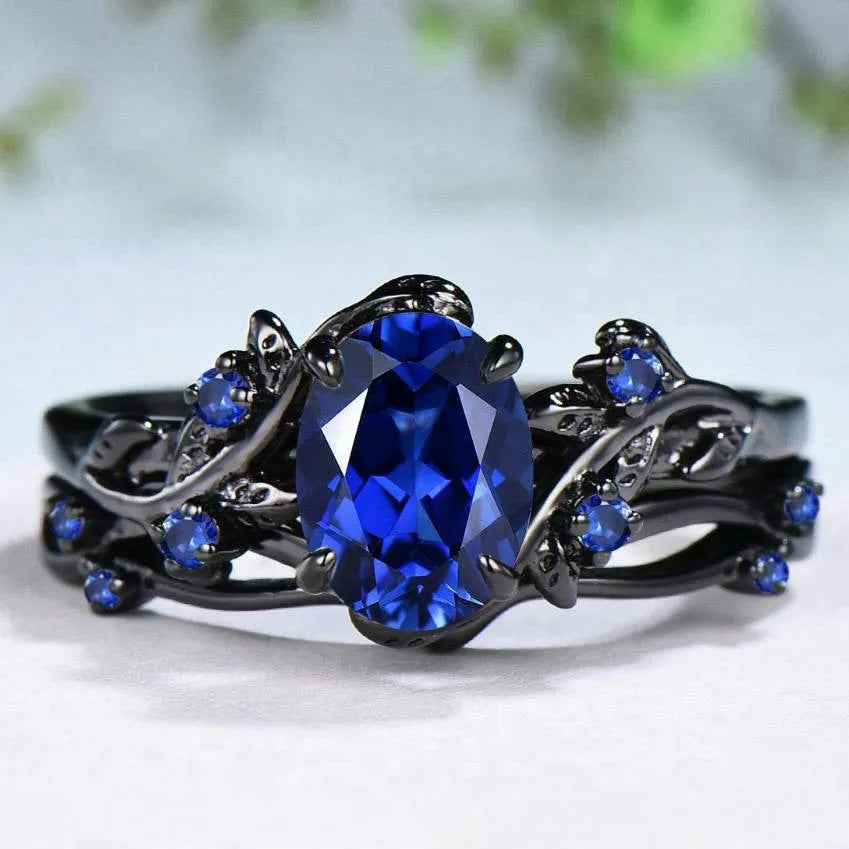 Gun black women's couple ring with navy blue rhinestone inlay on geometric copper band