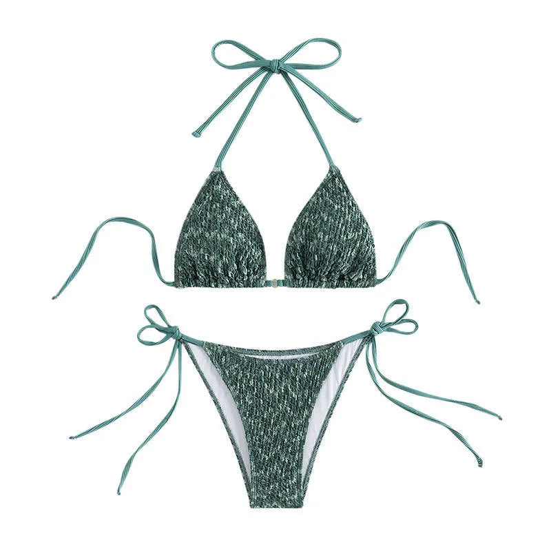 Green women's backless swimsuit with three-point halter strap design showing front and back views