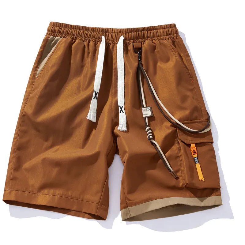 Men's plus size bamboo fibre sports shorts in a loose, high-waisted, straight-leg design on a hanger.