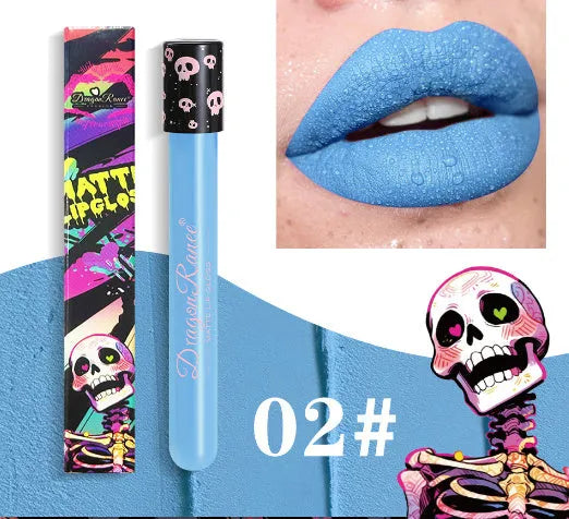 Halloween matte lip gloss in a test tube skull container showing gold and silver shades