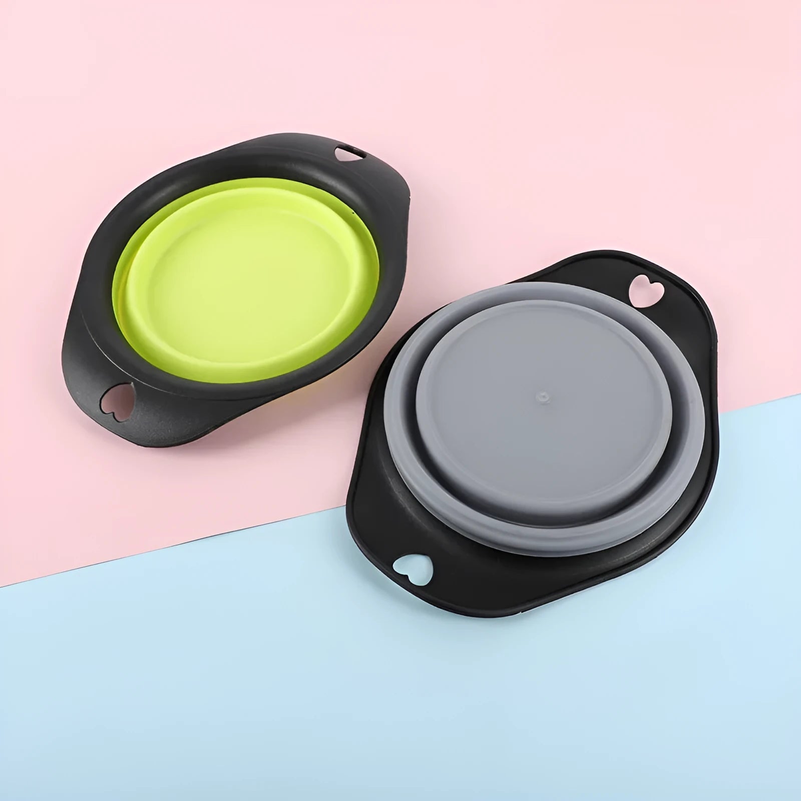Black silicone pet bowl shown open and folded flat next to a dog leash.