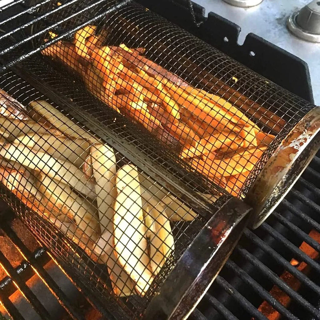 A cylindrical iron wire mesh rolling barbecue basket with a metal hook for handling.