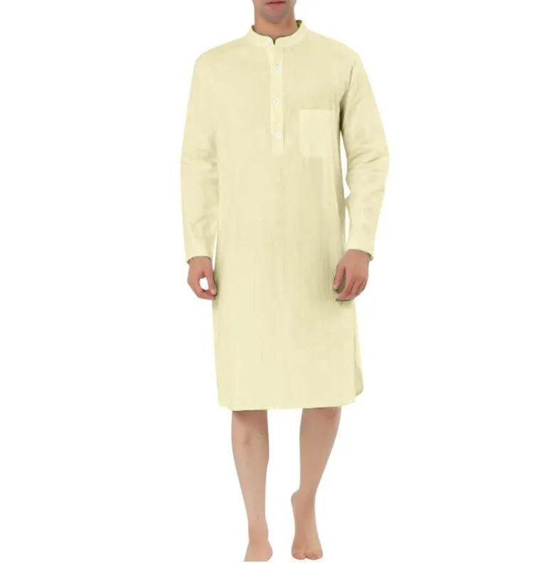 Men's light blue cotton shirt robe with front pockets hanging on a hanger.