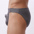 Men's loose-fit nylon underwear shown in blue, with a transparent, breathable fabric texture visible.