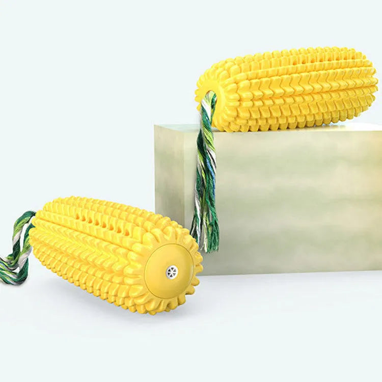 Yellow TPR simulation corn dog dog toy with bite-resistant surface, available with or without squeaker for play.