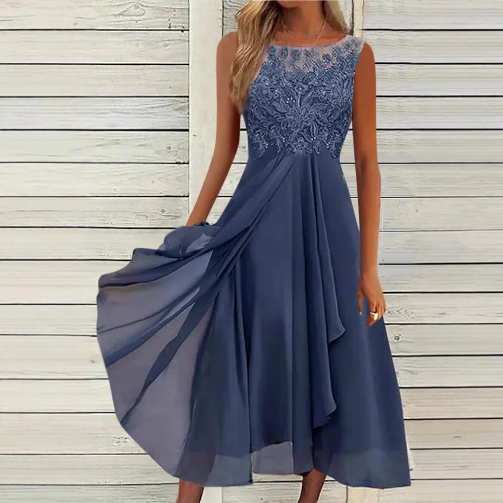 Women's sleeveless green chiffon dress with hollow-out lace detail, mid-length skirt.
