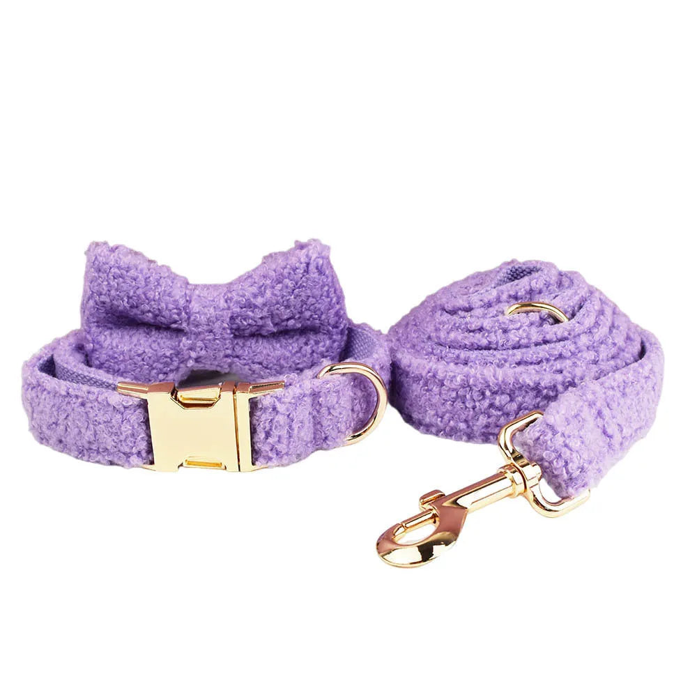 Purple cloth dog collar, leash, bow tie, and vest set for small dogs.