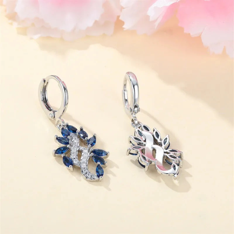 Women's sapphire blue alloy drop earrings with ethnic design elements