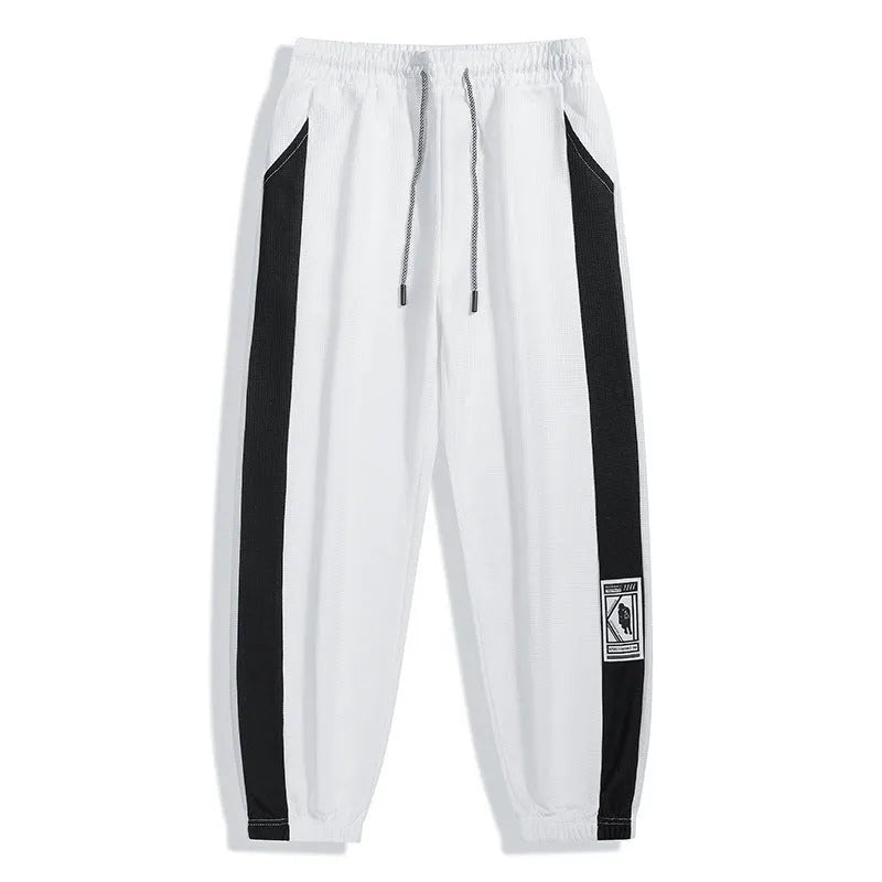 Men's casual wide leg fleece lined trousers in black, front view, showing drawstring waist and straight leg silhouette