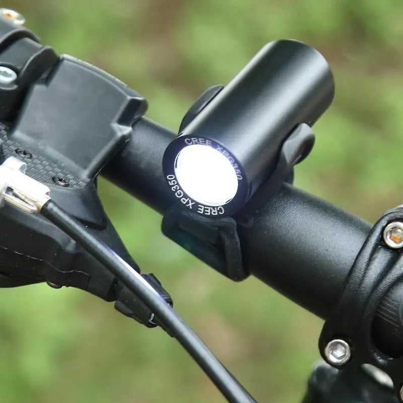 Black USB rechargeable bicycle front light with 350 lumens output.